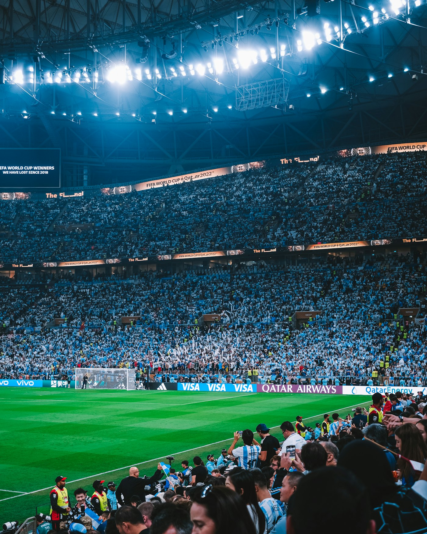A packed stadium at night
